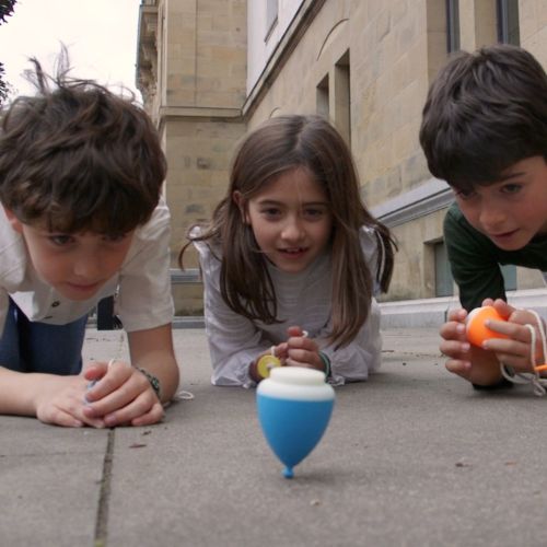 Dëna Snurretop Blå - selvlysende